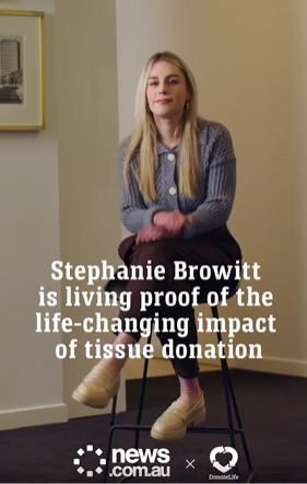 A young woman seated in a minimalist room, showcasing a message about the transformative effects of tissue donation.
