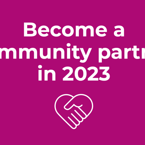 Become a community partner in 2023 with magenta background and white text