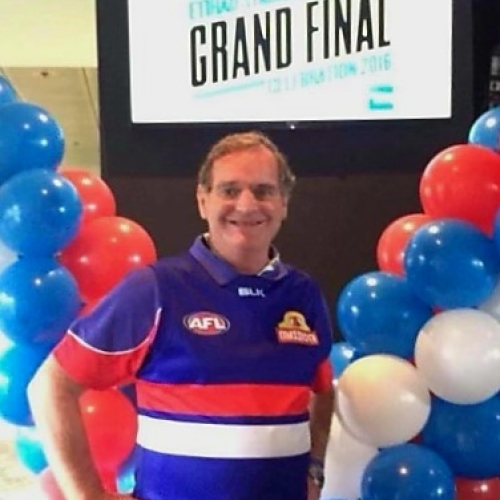 Photo of VIC donor, Max with bulldogs artwork