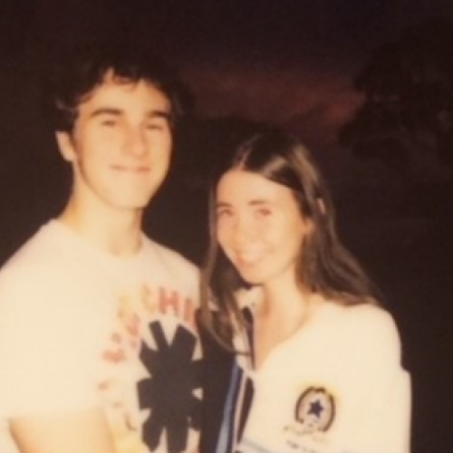 Tom standing with his girlfriend Caitlin