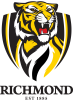 Richmond logo featuring a stylised roaring tiger head in yellow, black, and white inside a shield shape, with the text ‘RICHMOND EST 1885’ below.